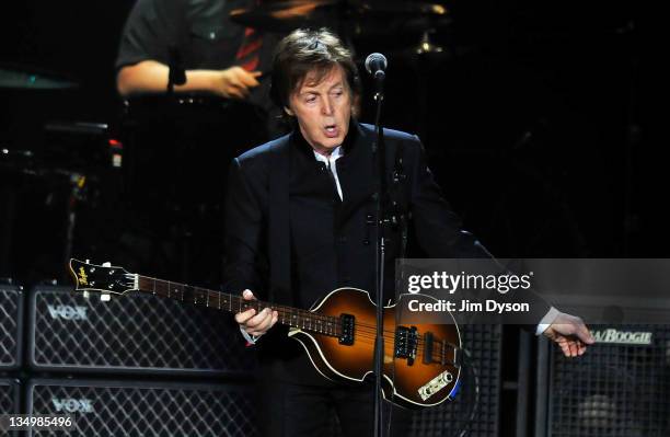 Sir Paul McCartney performs live on stage at O2 Arena on December 5, 2011 in London, United Kingdom.