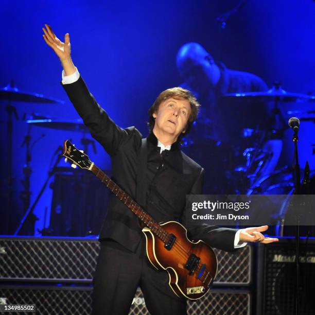 Sir Paul McCartney performs live on stage at O2 Arena on December 5, 2011 in London, United Kingdom.