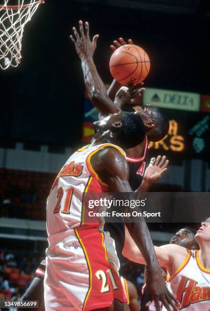 Dominique Wilkins of the Atlanta Hawks in action against the Miami Heat during an NBA basketball game circa 1991 at the Omni Coliseum in Atlanta,...