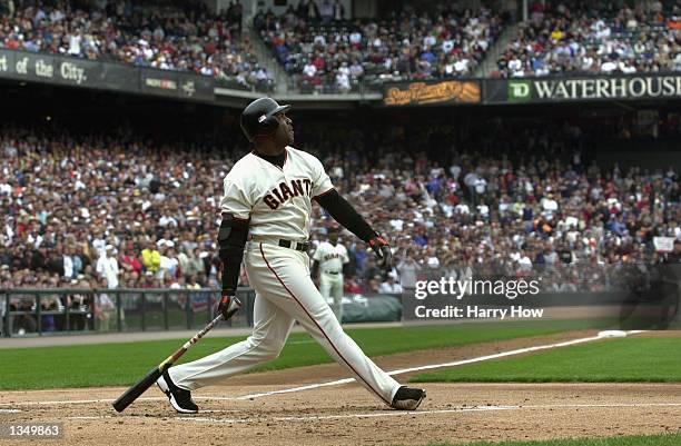 Barry Bonds of the San Francisco Giants watches his 73rd home run against the Los Angeles Dodgers during the game on October 7, 2001 at Pacific Bell...