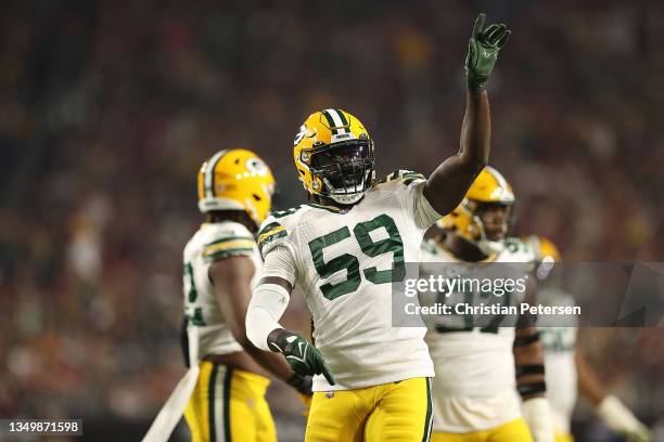 De'Vondre Campbell of the Green Bay Packers reacts after sacking Kyler Murray of the Arizona Cardinals during the first half at State Farm Stadium on...