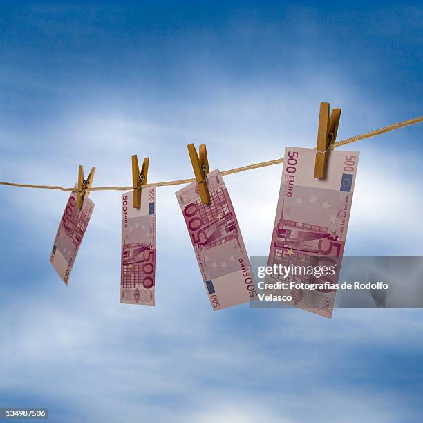 money laundering - five hundred euro banknote stock pictures, royalty-free photos & images