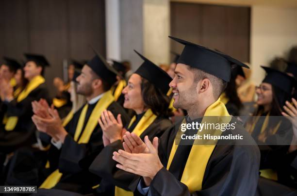 graduate students clapping in their graduation ceremony - graduation speech stock pictures, royalty-free photos & images