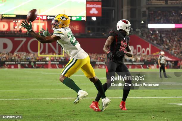 Rasul Douglas of the Green Bay Packers intercepts a pass intended for A.J. Green of the Arizona Cardinals during the fourth quarter of a game at...
