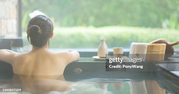 woman relax in hot spring - hot spring stock pictures, royalty-free photos & images