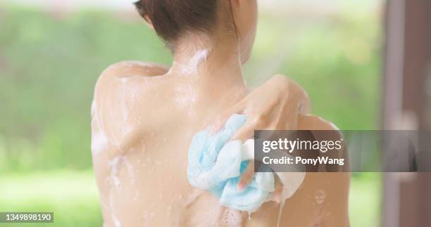 beauty woman take shower - douchegel stockfoto's en -beelden