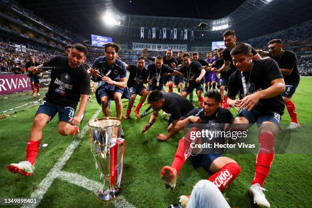 Players of Monterrey celebrate with the trophy after winning the final match of CONCACAF Champions League 2021 between Monterrey and Club America at...