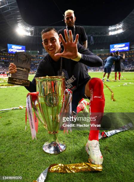 Rogelio Funes Mori of Monterrey poses with the trophy after winning the final match of CONCACAF Champions League 2021 between Monterrey and Club...
