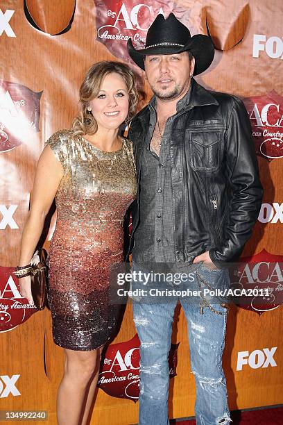 Musician Jason Aldean and Jessica Aldean arrives at the American Country Awards 2011 at the MGM Grand Garden Arena on December 5, 2011 in Las Vegas,...