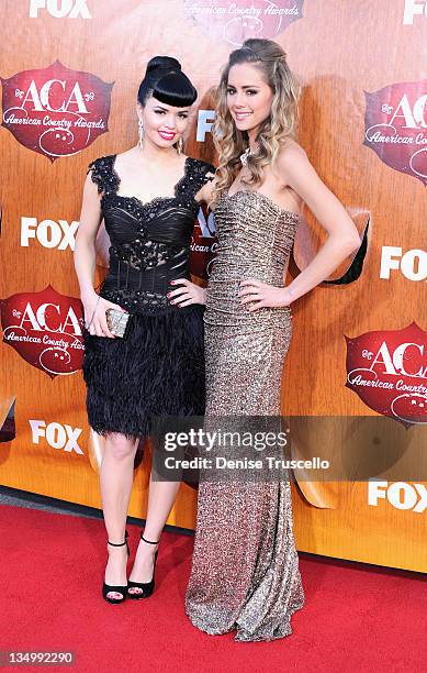 Recording artists Susie Brown and Danelle Leverett of The JaneDear Girls arrives at 2011 American Country Awards at MGM Grand Garden Arena on...