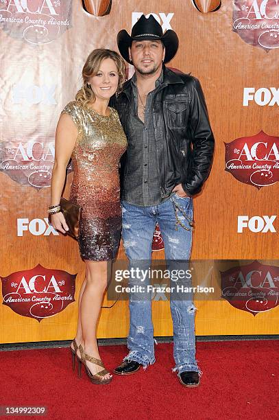 Singer Jason Aldean and Jessica Aldean arrive at the American Country Awards 2011 at the MGM Grand Garden Arena on December 5, 2011 in Las Vegas,...