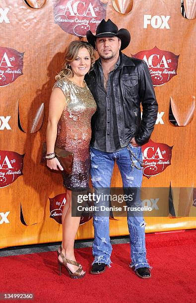 Musician Jason Aldean and Jessica Aldean arrives at 2011 American Country Awards at MGM Grand Garden Arena on December 5, 2011 in Las Vegas, Nevada.