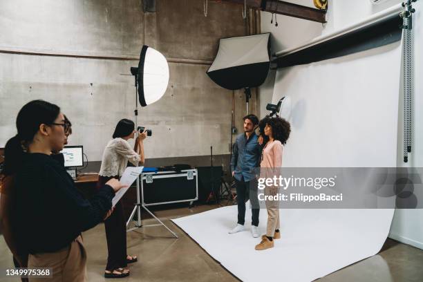 fashion photo shoot in a modern loft - jobs film stockfoto's en -beelden