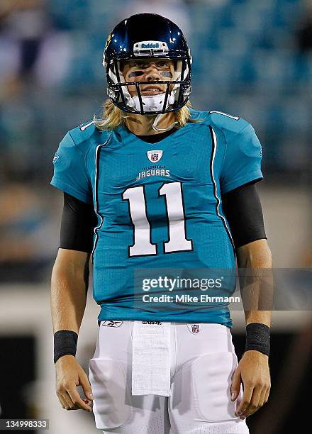 Quarterback Blaine Gabbert of the Jacksonville Jaguars looks on during warm ups prior to playing the San Diego Chargers at EverBank Field on December...