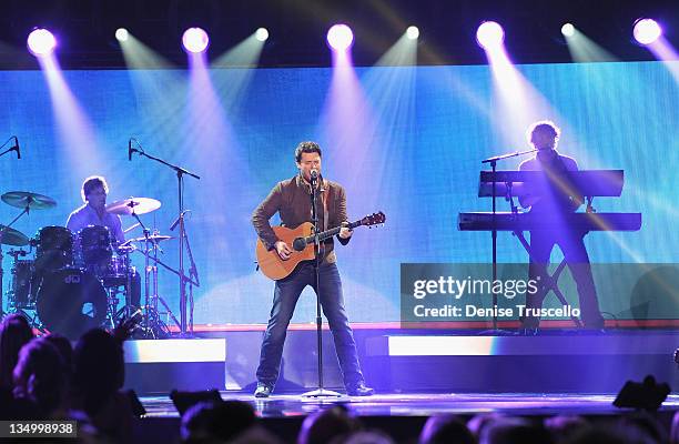 Musician Chris Young performs onstage during the 2011 American Country Awards at MGM Grand Garden Arena on December 5, 2011 in Las Vegas, Nevada.