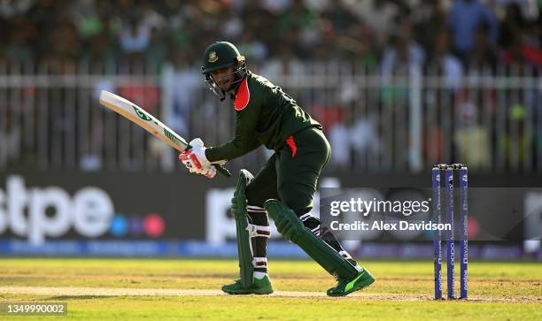 Shakib Al Hasan of Bangladesh plays a shot during the ICC Men's T20 World Cup match between West Indies and Bangladesh at Sharjah Cricket Stadium on...