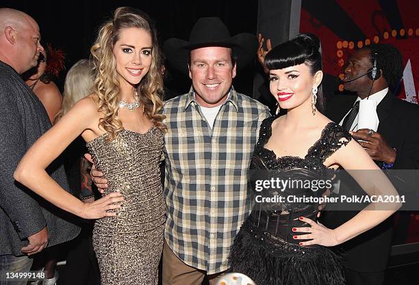 Musicians Danelle Leverett and Susie Brown of the Jane Dear Girls and Musician Rodney Carrington attends the American Country Awards 2011 at the MGM...