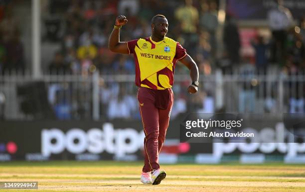 Andre Russell of West Indies celebrates the wicket of Shakib Al Hasan of Bangladesh during the ICC Men's T20 World Cup match between West Indies and...
