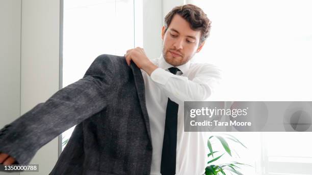 Getting 13,748 Men Getting Dressed Stock Photos, High-Res Pictures, and Images ...
