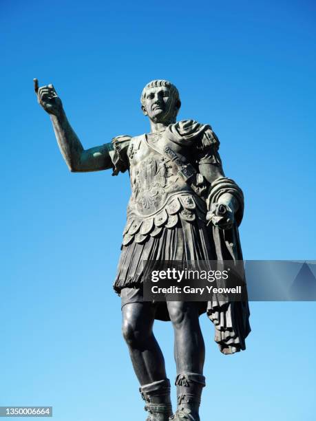 bronze statue of emperor trajan in rome - rome empire stock pictures, royalty-free photos & images