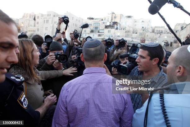 Naftali Bennett , head of the Israeli hardline national religious party, Jewish Home,speaks to the press during a visits the Western Wall, Judaism...