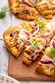Barbecue chicken flatbreads with red onion