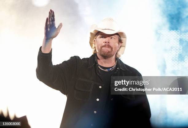 Musician Toby Keith accepts the Artist of the Decade Award onstage at the American Country Awards 2011 at the MGM Grand Garden Arena on December 5,...