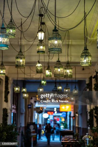 alley with bars and restaurants of budapest - budapest nightlife stock pictures, royalty-free photos & images