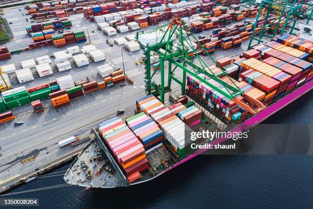 container ship at port - cargo ship stock pictures, royalty-free photos & images