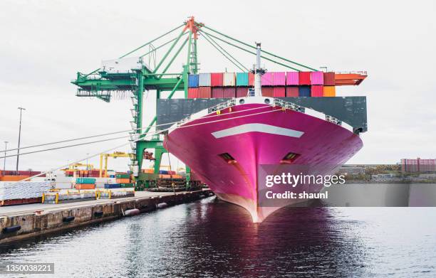 container ship at port - container ship bow stock pictures, royalty-free photos & images