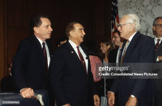 View of, from left. US Senators Arlen Specter , Senate Judiciary ranking member J Strom Thurmond , and Howard Metzenbaum as they talk prior to a...