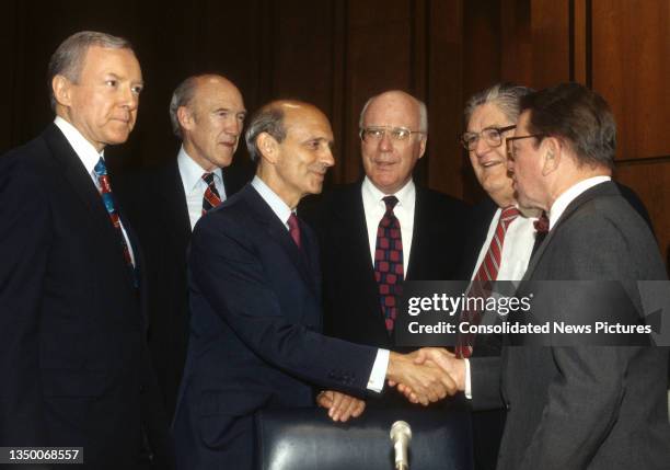 Court of Appeals Chief Judge Stephen Breyer shakes with US Senator Paul Simon before the former's Supreme Court Associate Justice confirmation...