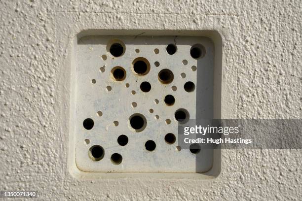 Bee bricks made from recycled material feature in Nansledan, on October 29, 2021 in Newquay, England. Nansledan is the second development whose...