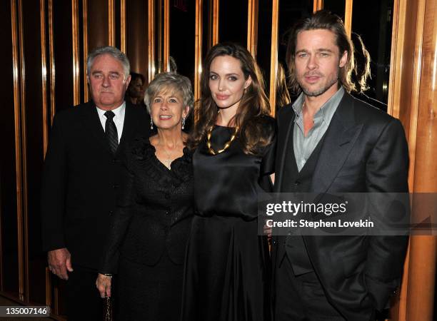 Angelina Jolie and Brad Pitt pose with Bill Ptt and Jane Pitt at the after party for the premiere of "In the Land of Blood and Honey" at the The...