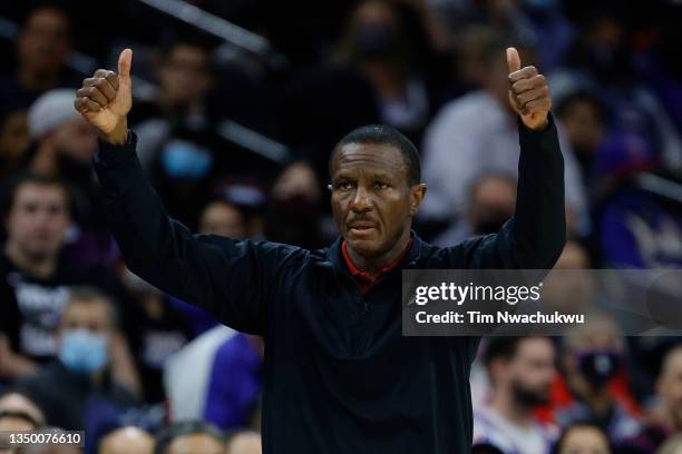 Head coach Dwane Casey of the Detroit Pistons calls to players during the second quarter against the Philadelphia 76ers at Wells Fargo Center on...