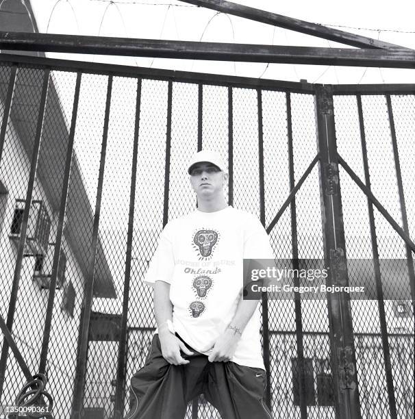 Rapper Eminem at Bob & Charlie Roberts Spotlight Tattoo shop on May 8th, 1999 in Los Angeles, California.