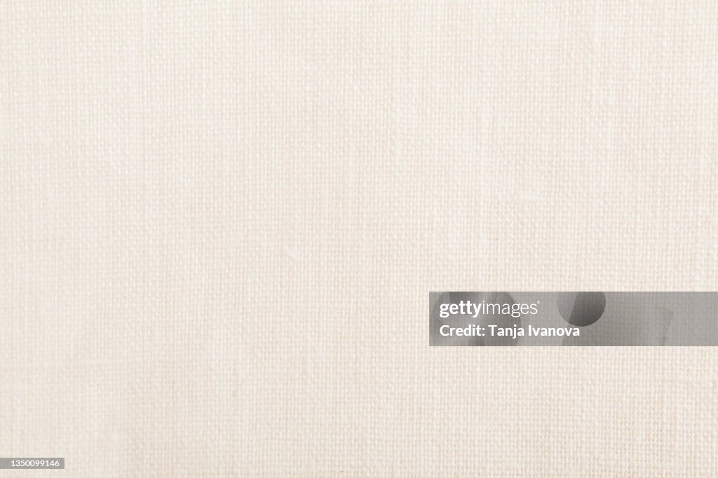Texture of the linen fabric is white.