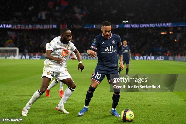 Neymar of Paris Saint-Germain holds off Nanitamo Jonathan Ikone of Lille during the Ligue 1 Uber Eats match between Paris Saint Germain and Lille OSC...