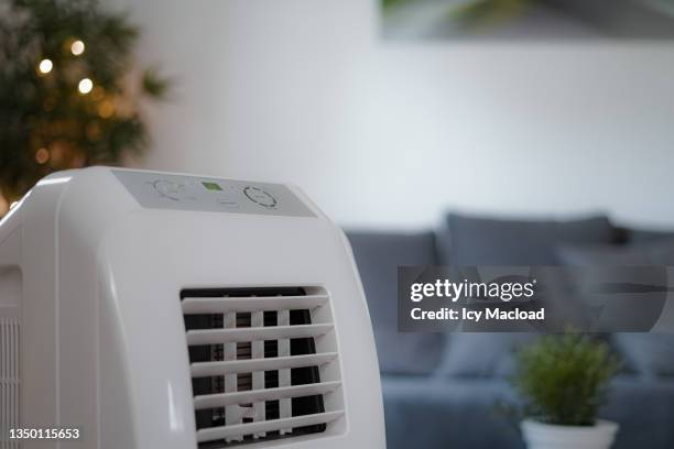 refresh the air because of climate change - ventilador imagens e fotografias de stock