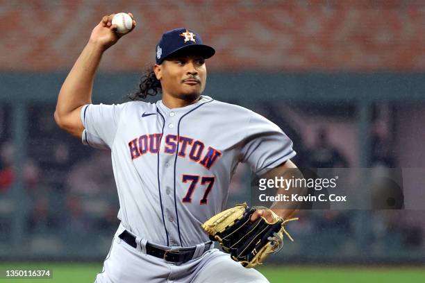Luis Garcia of the Houston Astros delivers the pitch against the Atlanta Braves during the first inning in Game Three of the World Series at Truist...