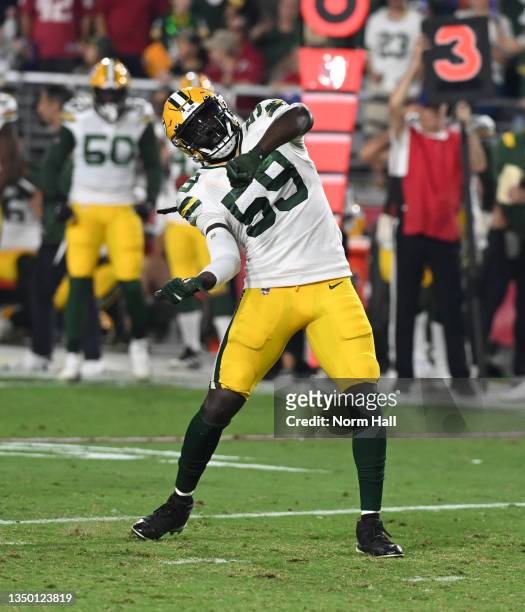 DeVondre Campbell of the Green Bay Packers celebrates after making a tackle against the Arizona Cardinals at State Farm Stadium on October 28, 2021...