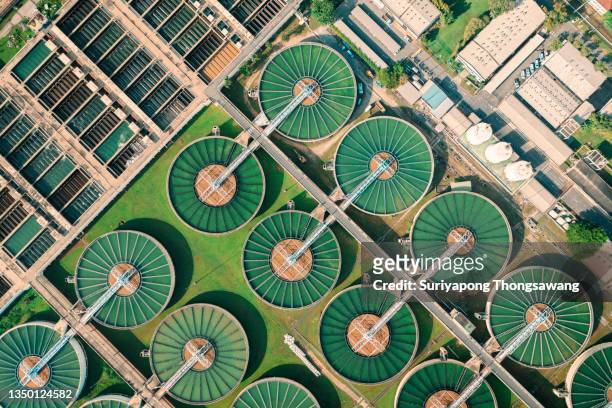 aerial top view water treatment plant for purify water or environment conservation. - environmental building stockfoto's en -beelden