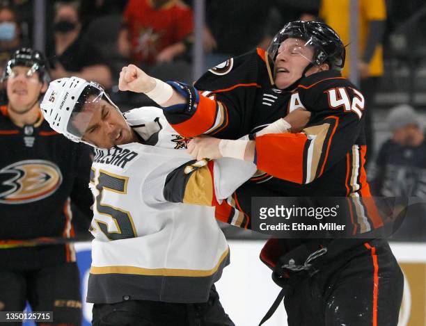 Keegan Kolesar of the Vegas Golden Knights and Josh Manson of the Anaheim Ducks fight in the second period of their game at T-Mobile Arena on October...