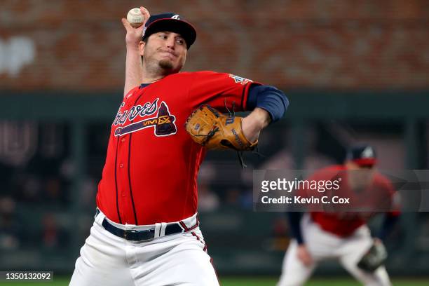 Luke Jackson of the Atlanta Braves delivers the pitch against the Houston Astros during the seventh inning in Game Three of the World Series at...