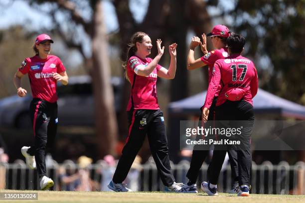 Lauren Cheatle of the Sixers celebrates the wicket of Jemimah Rodrigues of the Renegades during the Women's Big Bash League match between the...