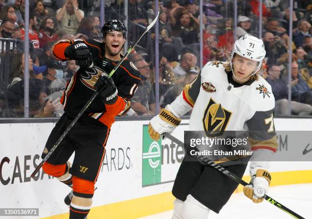 Adam Henrique of the Anaheim Ducks celebrates his third-period goal tying the game against the Vegas Golden Knights at 4-4 as William Karlsson of the...