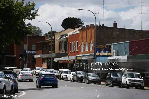 Cars move through Moss Vale shopping district on October 30, 2021 in Moss Vale, Australia. COVID-19 travel restrictions will ease from Monday 1...