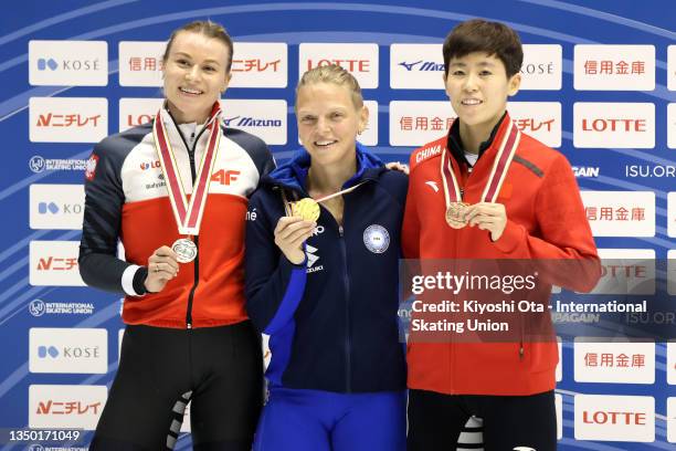 Silver medalist Natalia Maliszewska of Poland, gold medalist Arianna Fontana of Italy and bronze medalist Fan Kexin of China pose at the medal...