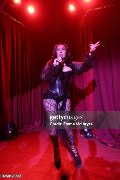 Kali Uchis performs onstage during the Ghost Town Halloween Party with Parcast's "Obsessed" hosts Benito Skinner and Mary Beth Barone, prestented by...