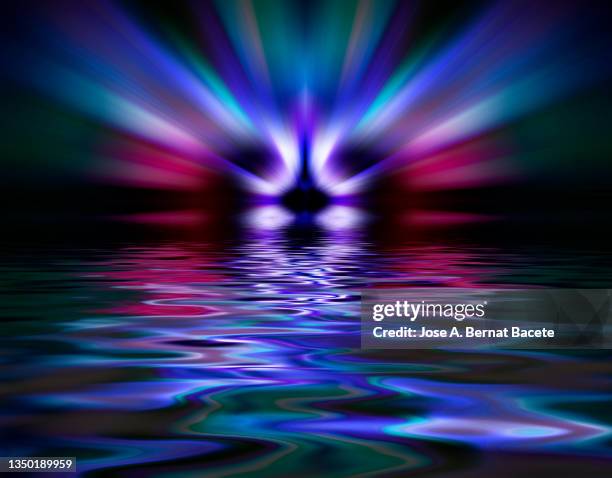 outer space with a bright star reflected on the surface of the water. - space and astronomy stock pictures, royalty-free photos & images